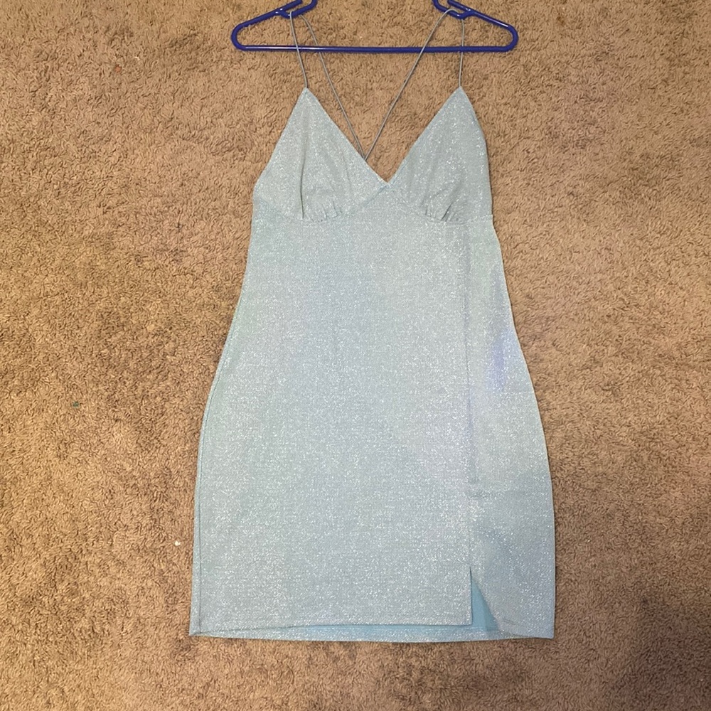 This is a blue sparkle dress from h&m.It is super cute and was unworn.